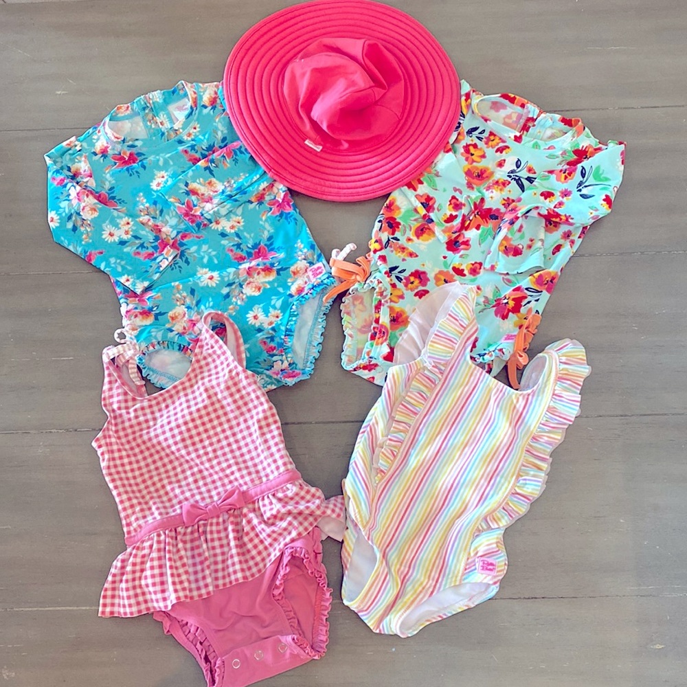4 Ruffle Butts swimsuits and matching hat, Size 18-24 months.  Great condition!
